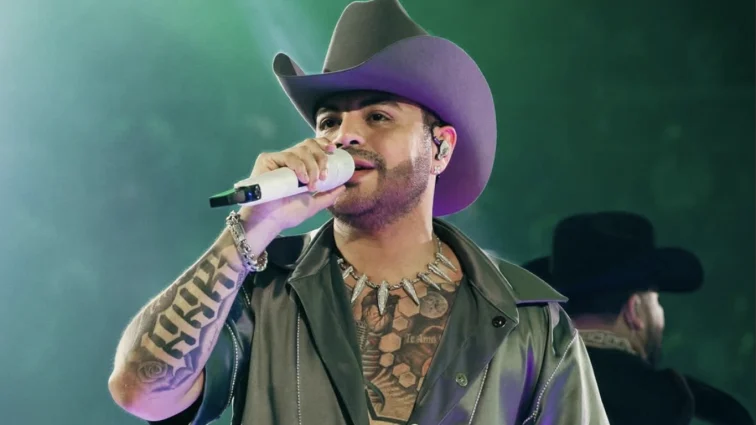 Eduin Caz nuevo look con barba en concierto