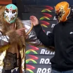 Eduin Caz junto a Máscara Dorada durante su aparición especial en la Arena México