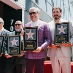 Integrantes de Intocable durante la develación de su estrella en el Paseo de la Fama de Hollywood.